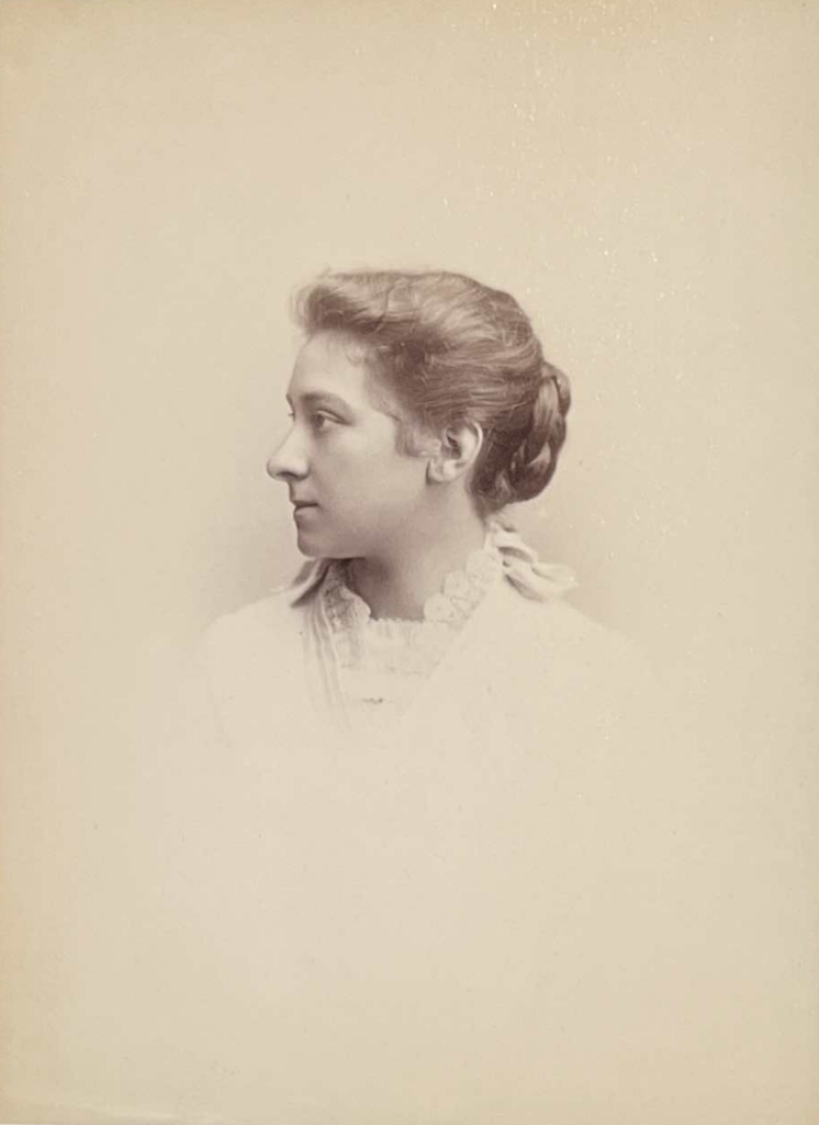 Portrait of Louisa Cheever with her head turned to the side