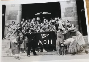 An image of the A.O.H with their banner. They are all making goofy faces.