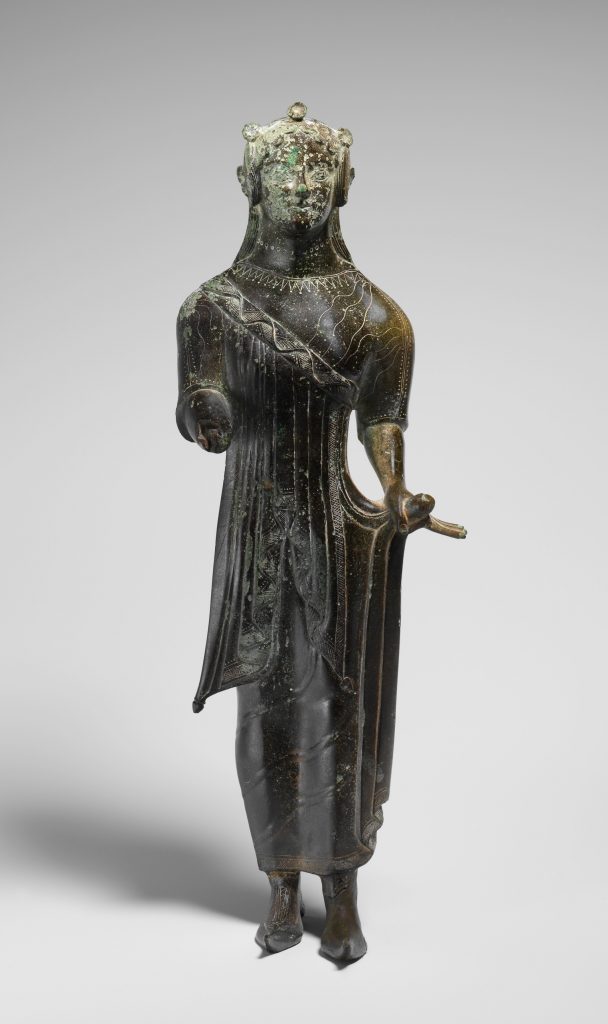 a bronze statuette of an Etruscan women