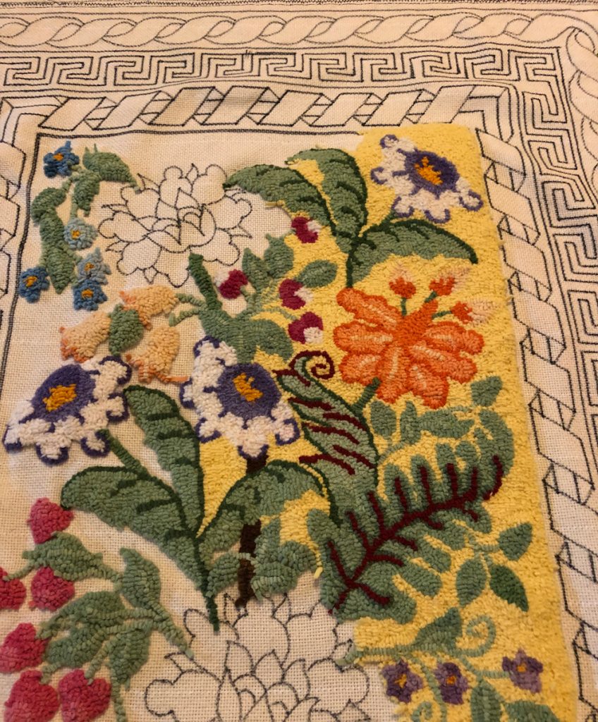 partially complete rug hooking design
