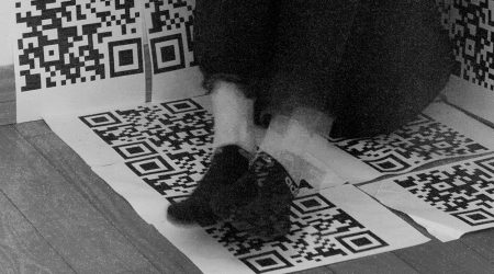 double exposed feet over QR codes
