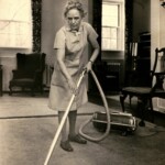 Housekeeper Julia Reardon vacuums a house living room, 1972.
