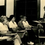 Housekeepers attending a lecture on labor relations, likely as part of training, in 1973. Of the two housekeepers in the middle of the row, one is wearing pants and the other is wearing a skirt. The transition from skirts to pants in the uniforms began in the 1970s.