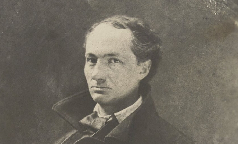 Portrait de Baudelaire : à mi-corps, assis, de trois quarts à gauche, une main glissée dans sa veste.