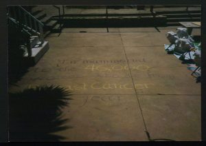 image of chalk caption dedicating installation to cancer survivors 