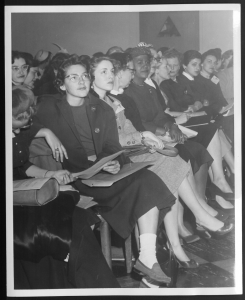 black and white photograph of women sitting in rows at the first national Y-Teen confernece
