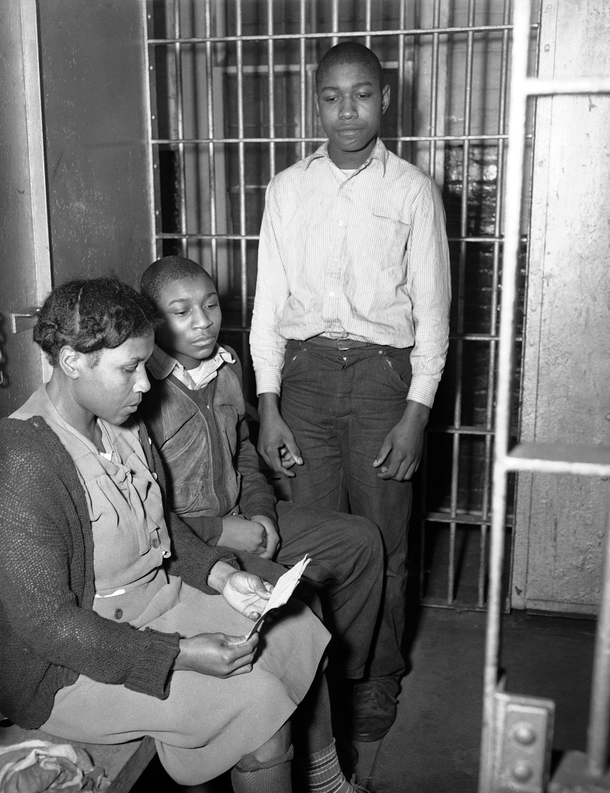 Figure 47. Rosa Lee Ingram and sons in jail cell, Albany, Georgia, March 3, 1948