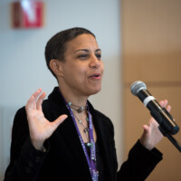 Elizabeth Stordeur Pryor introduces a panel on "When and Where I Enter." (Shana Sureck Photography)