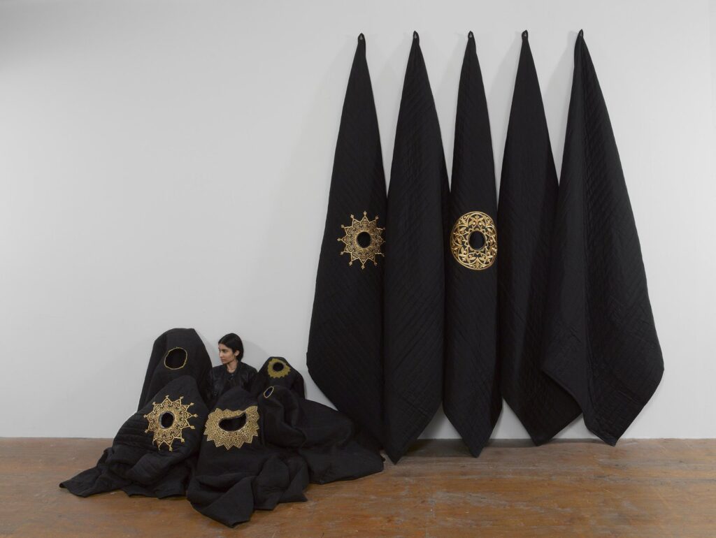 Sculptural textile pieces titled "Acoustic Sound Blankets" by Baseera Khan
