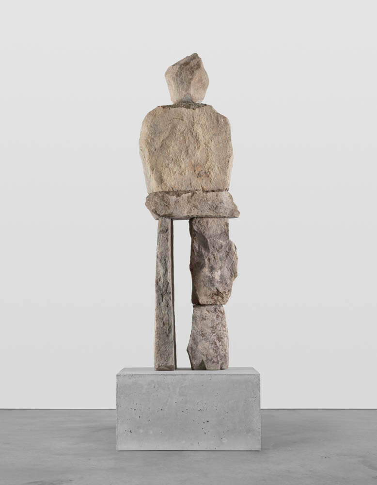 Stone humanoid statue "the reassured"