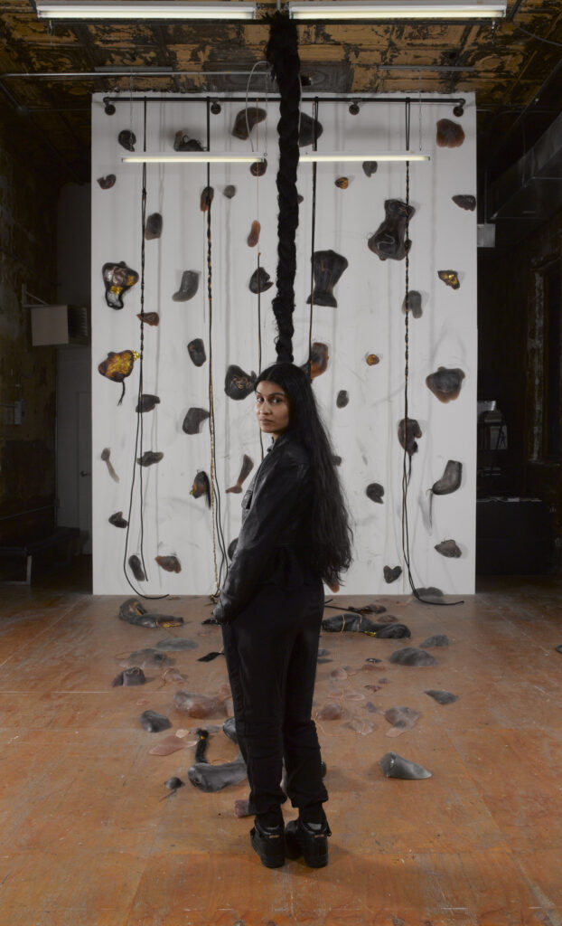 Artist Baseera Khan with her work, "Braidrage"