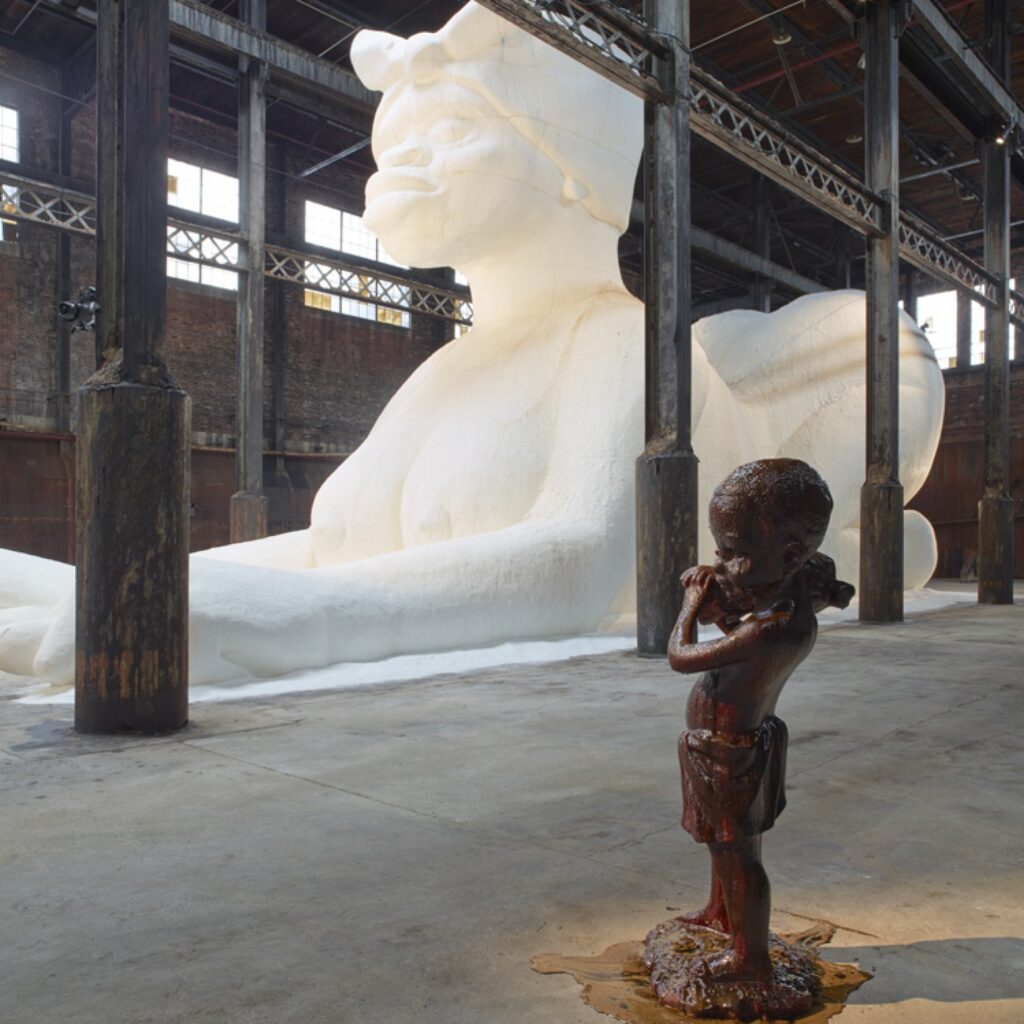the Marvelous Sugar Baby, an Homage to the unpaid and overworked Artisans who have refined our Sweet tastes from the cane fields to the Kitchens of the New World on the Occasion of the demolition of the Domino Sugar Refining Plant