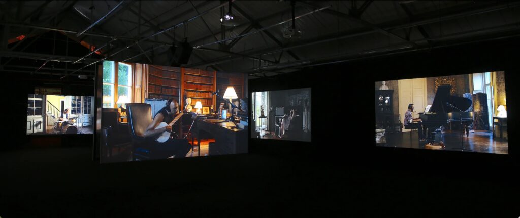 Photo of Installation of 9-screen video "The Visitors" by Ragnar Kjartansson