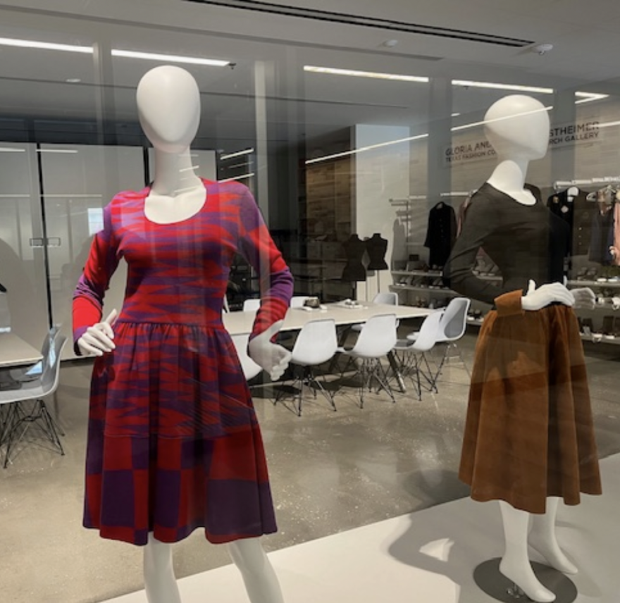 two manequins wearing dresses