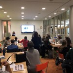 Concentrator Emily Biggs '19 shares her portfolio during January 2019 retreat.