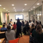 Concentrator Emily Biggs '19 shares her portfolio during January 2019 retreat.