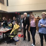 MUX Seniors celebrate their completion of their capstones in a reception.