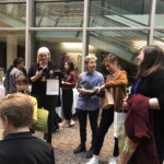 Concentrators open their MUX mugs as a keepsake of their studies.