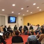 Some MUX students listen to Frank Mitchell talk for a Museums Today event.