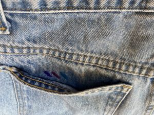 The back pocket of a pair of shorts