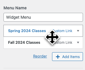 A WordPress menu with the cross symbol icon