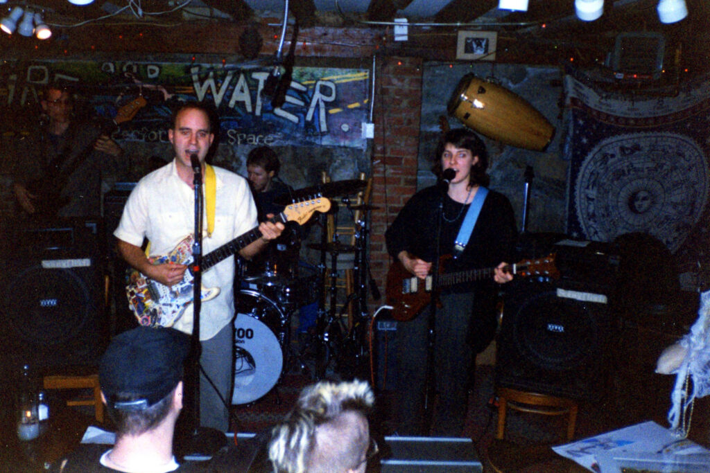 Dingo Roi performs at the Fire & Water Cafe, 1997.