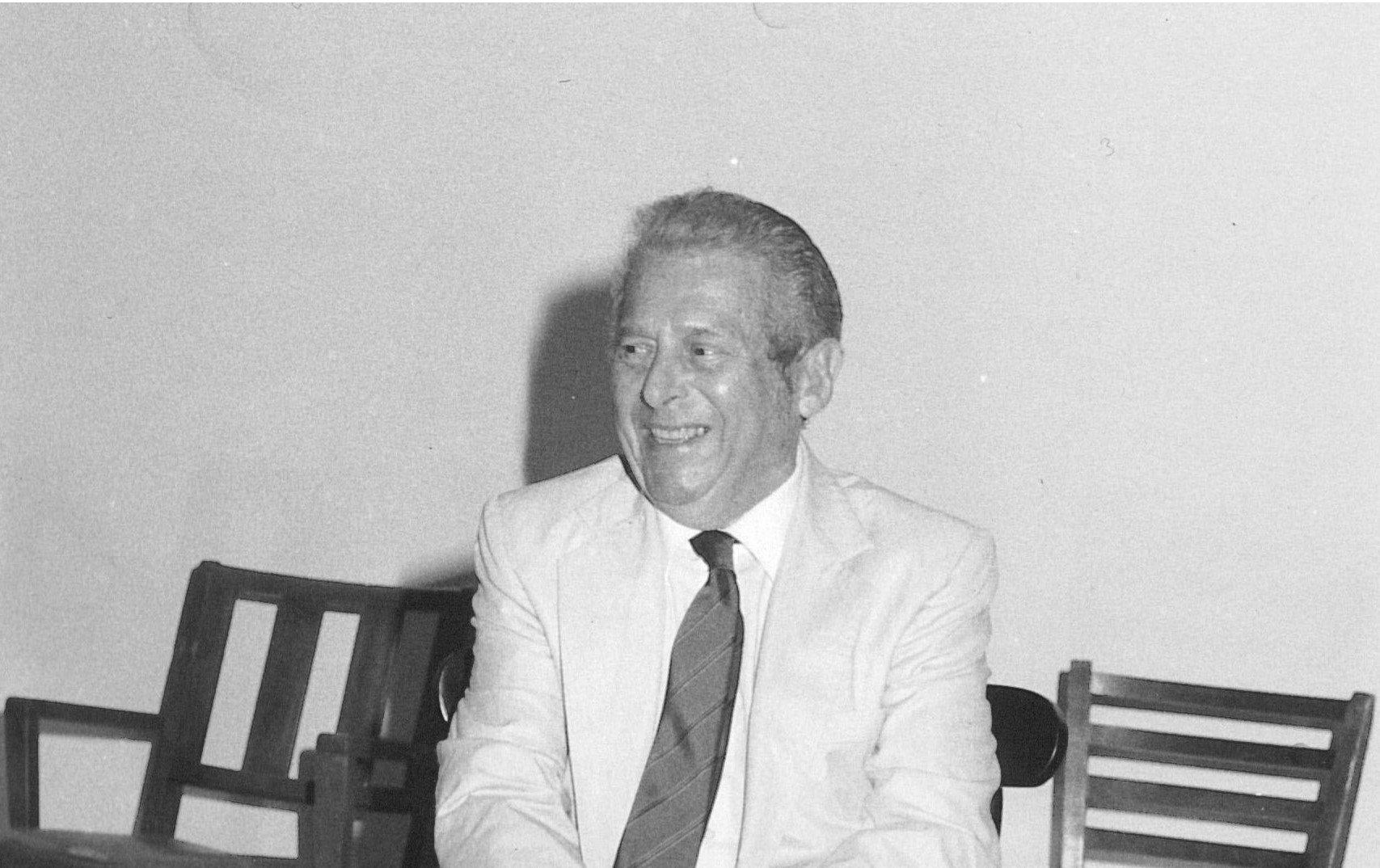 Black and white photo of Irving Kaufman seated