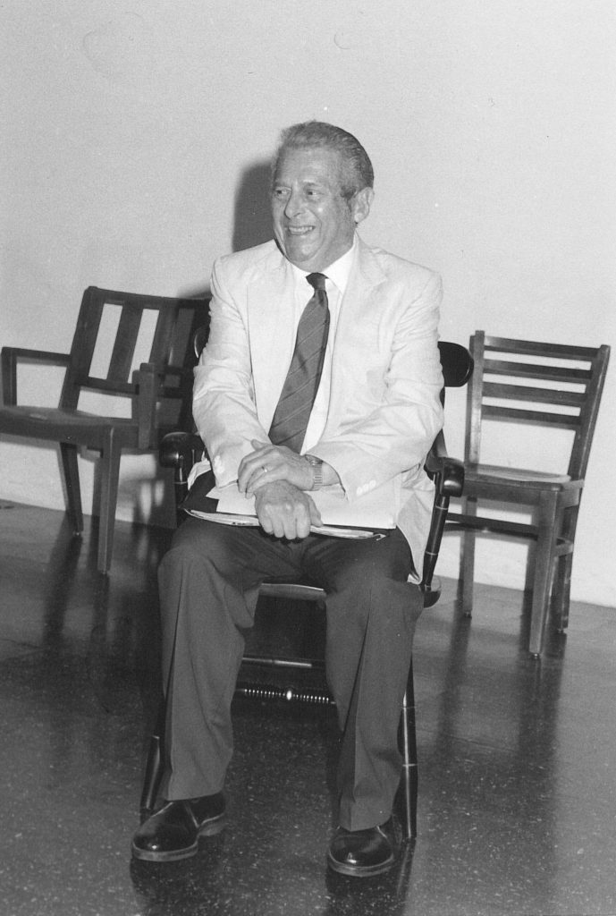 Black and white photo of Irving Kaufman seated