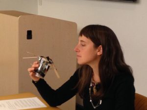 Elena Betke-Brunswick examines one of the student-made "windproof machines." 