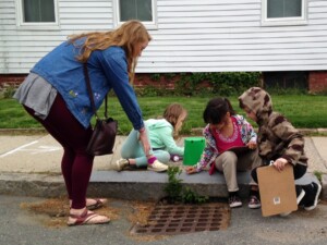 First Grade Pilot, written by Katy Butler Anna and students observing storm drain